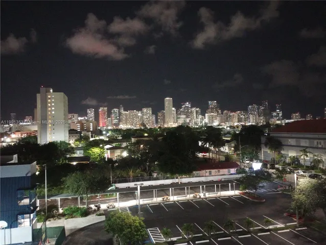 a view of a balcony with table and chairs