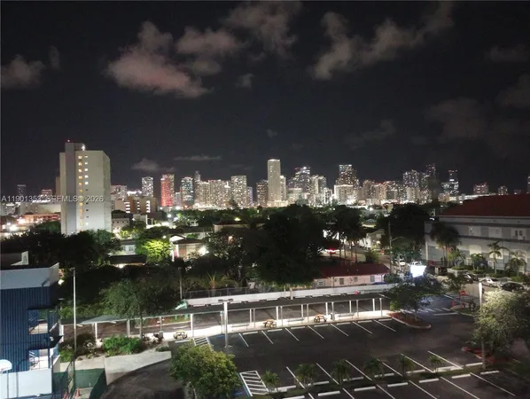 a view of a balcony with table and chairs