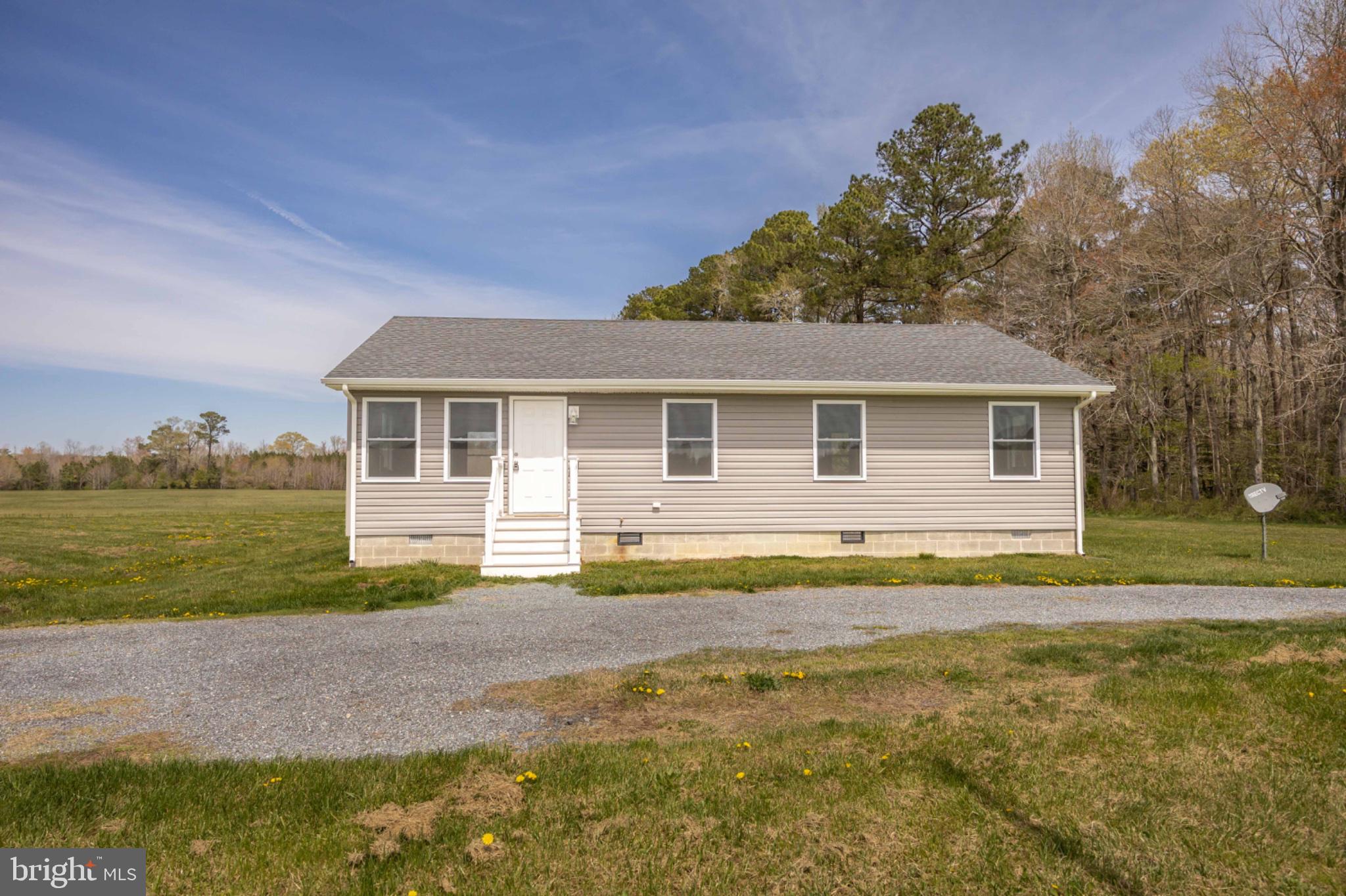 7121 Cedartown Road Snow Hill, MD 21863 - Photo 2 of 52 a view of a house with a yard and lake view