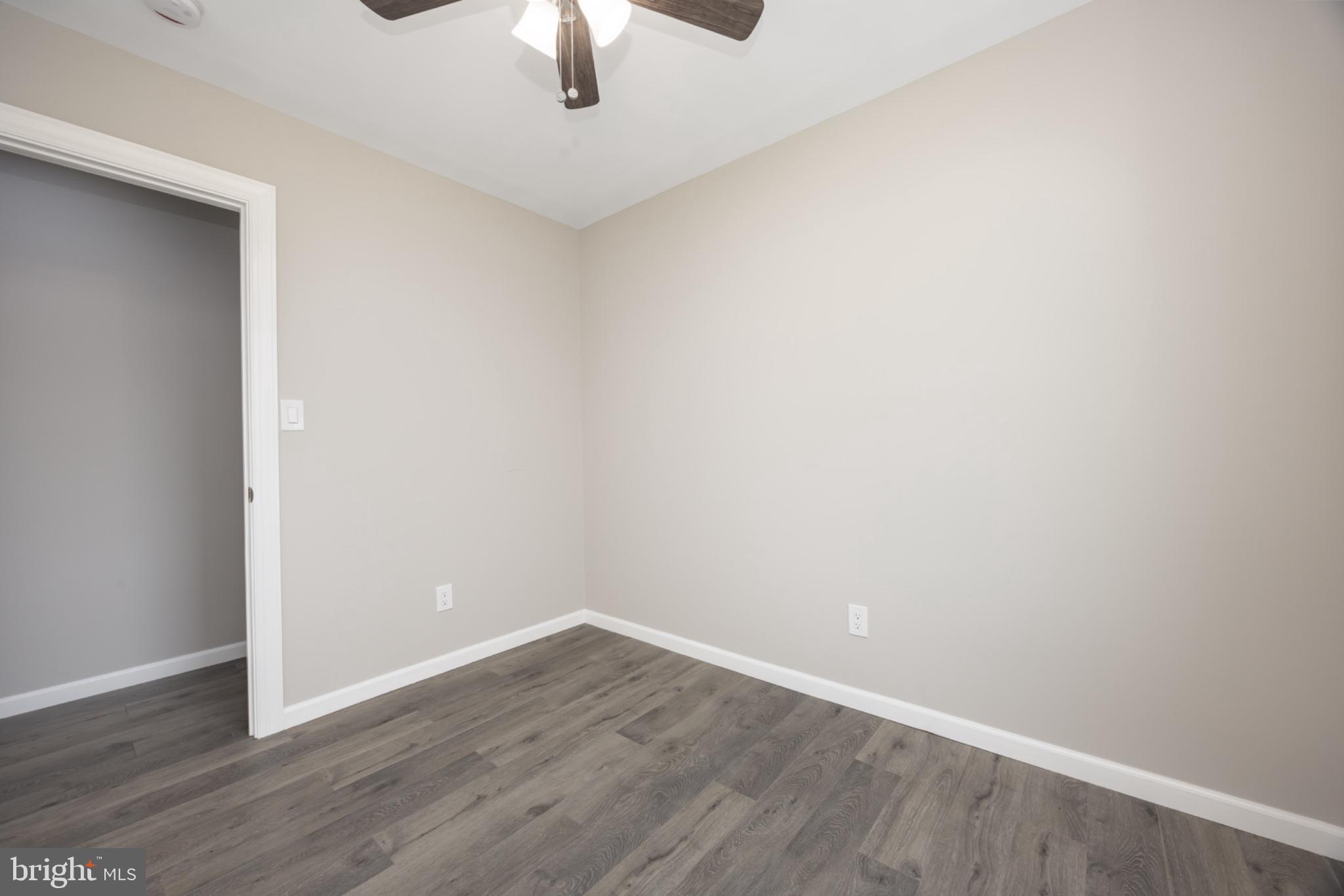 7121 Cedartown Road Snow Hill, MD 21863 - Photo 24 of 52 a view of an empty room with wooden floor
