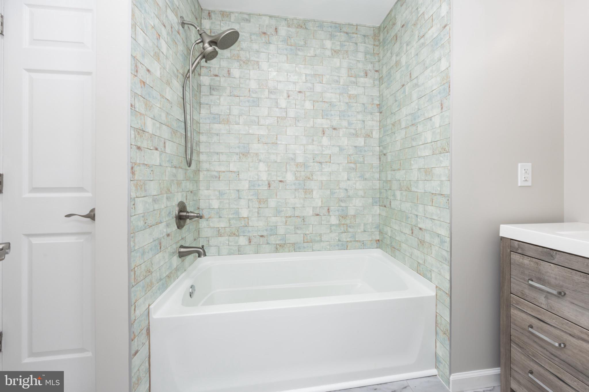 7121 Cedartown Road Snow Hill, MD 21863 - Photo 26 of 52 a bathroom with a bathtub