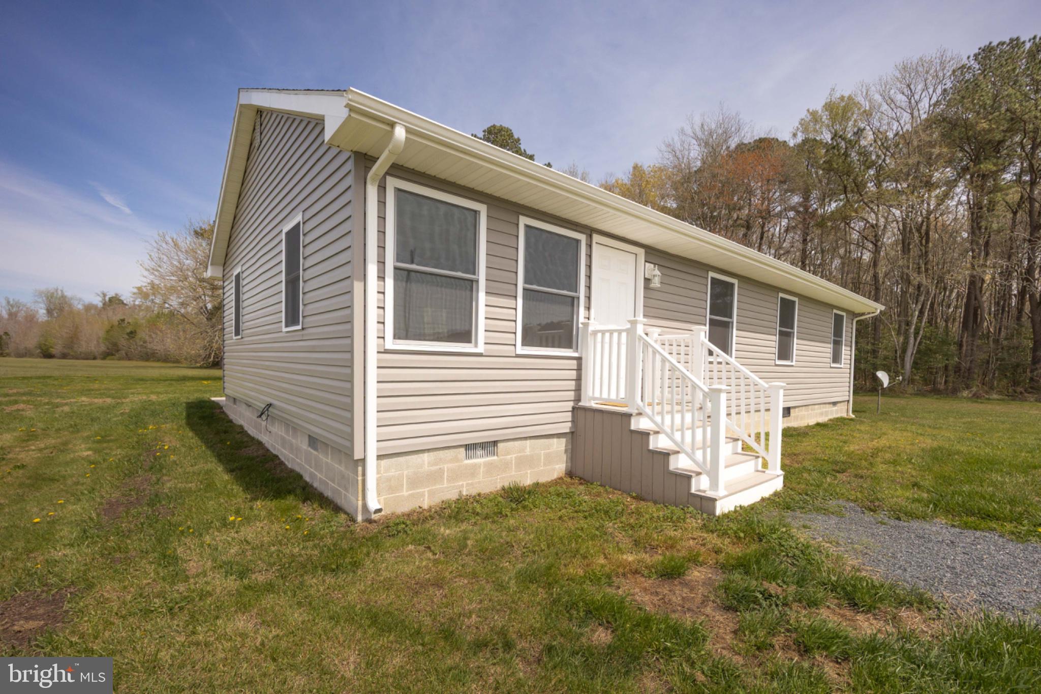 7121 Cedartown Road Snow Hill, MD 21863 - Photo 6 of 52 a view of a house with a yard