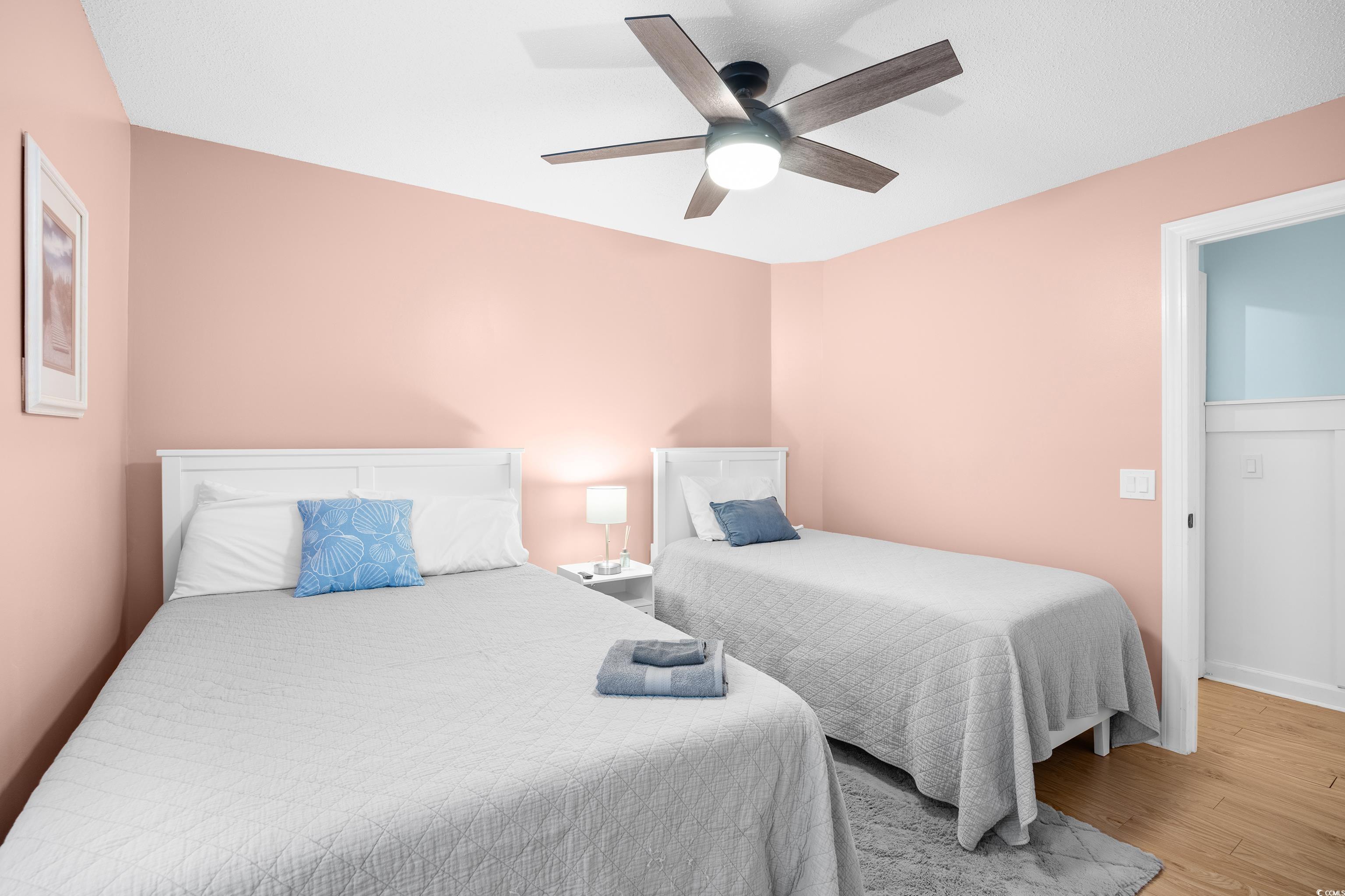 4277 Santolina Way, Unit D Murrells Inlet, SC 29576 - Photo 19 of 40 Bedroom featuring a ceiling fan and wood finished floors