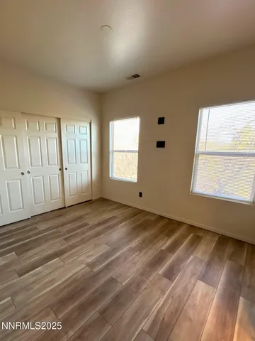 a view of an empty room and window