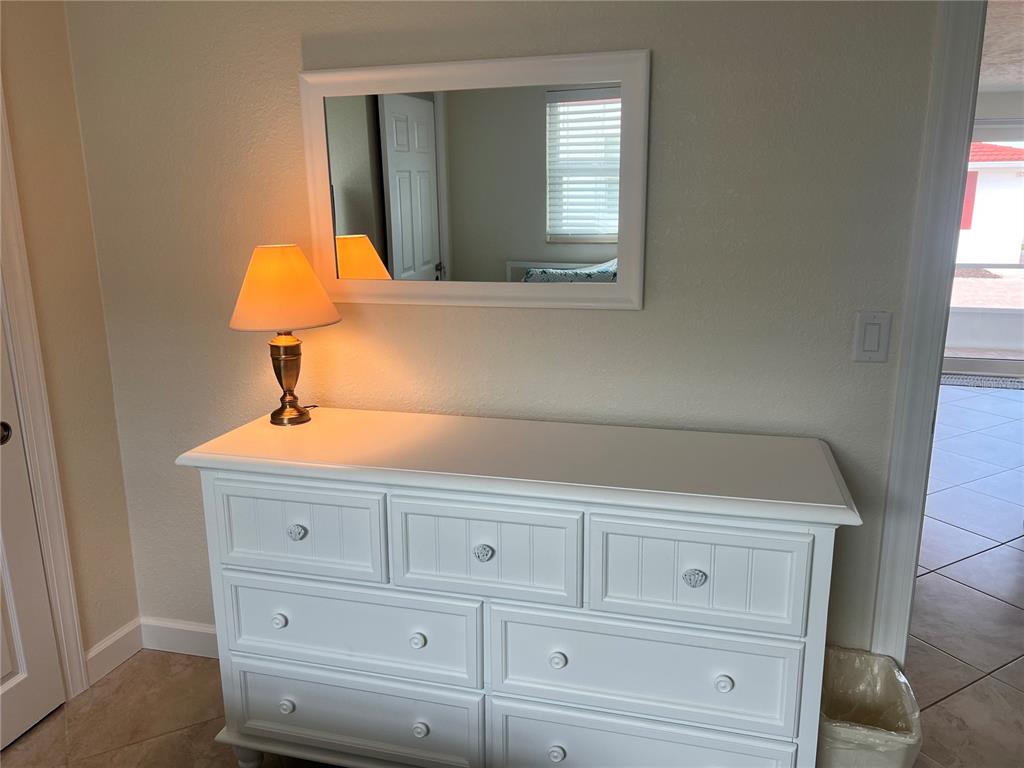 6154 Midnight Pass Road, Unit B07 Sarasota, FL 34242 - Photo 13 of 15 a bathroom with a sink and a mirror