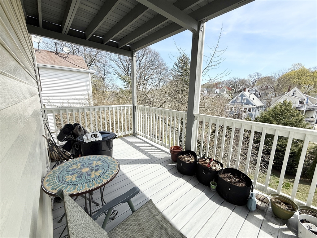 81 Florence Street, Unit 2 Boston, MA 02131 - Photo 11 of 11 a view of a balcony with furniture