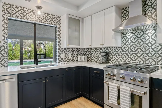 a room with furniture pool table and window