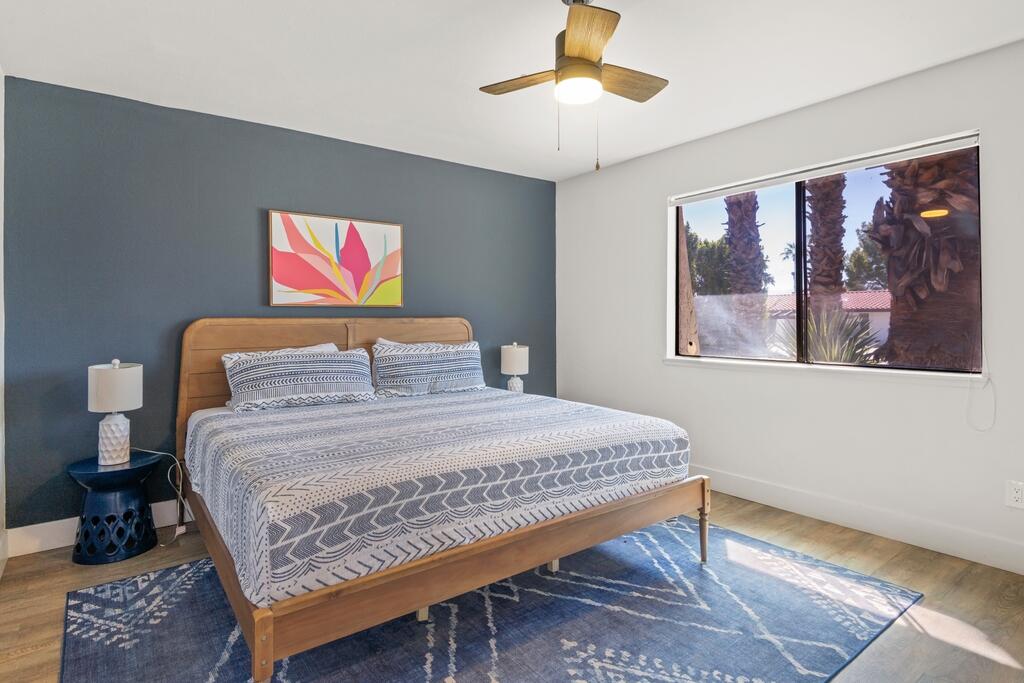 3060 East Verona Road Palm Springs, CA 92262 - Photo 19 of 33 a bedroom with a bed and dresser