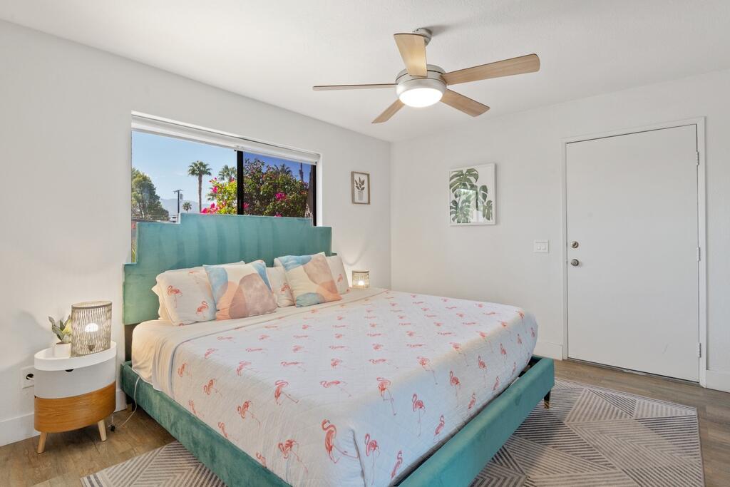 3060 East Verona Road Palm Springs, CA 92262 - Photo 20 of 33 a bed room with a bed and a painting on the wall
