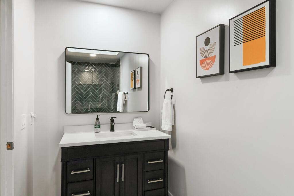 3060 East Verona Road Palm Springs, CA 92262 - Photo 21 of 33 a bathroom with a sink vanity and mirror