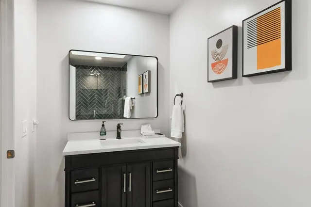 a view of a house with a yard porch and sitting area