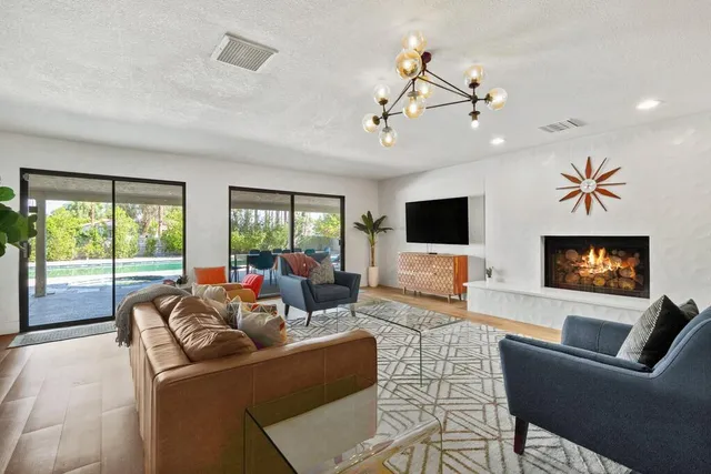 a view of a dining room and a table and chairs