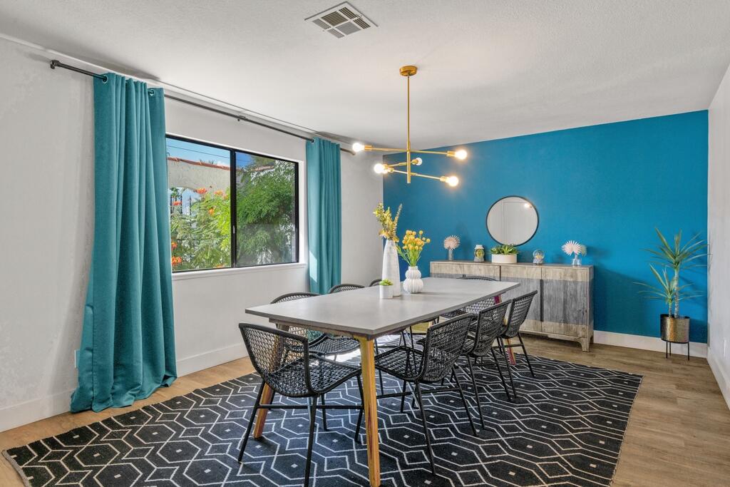 3060 East Verona Road Palm Springs, CA 92262 - Photo 7 of 33 a view of a dining room and a table and chairs