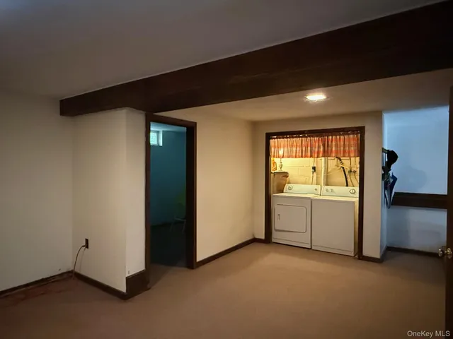 a view of an empty room with a sink