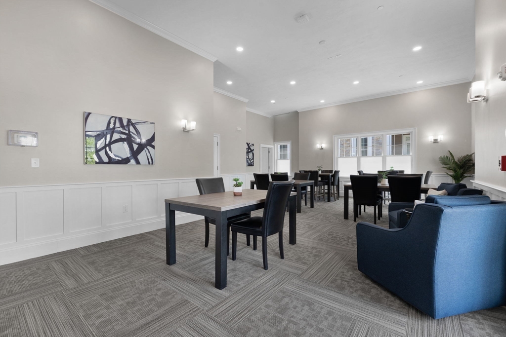 320 Middlesex Avenue, Unit B109 Medford, MA 02155 - Photo 19 of 21 a view of a dining area with furniture