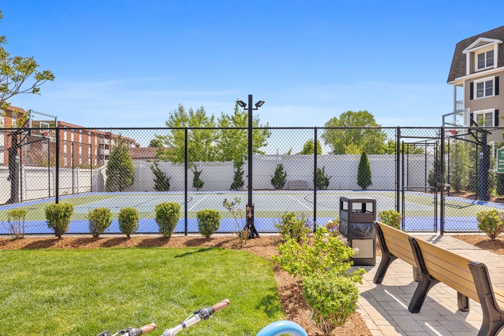 320 Middlesex Avenue, Unit B109 Medford, MA 02155 - Photo 21 of 21 a view of a swimming pool with a patio