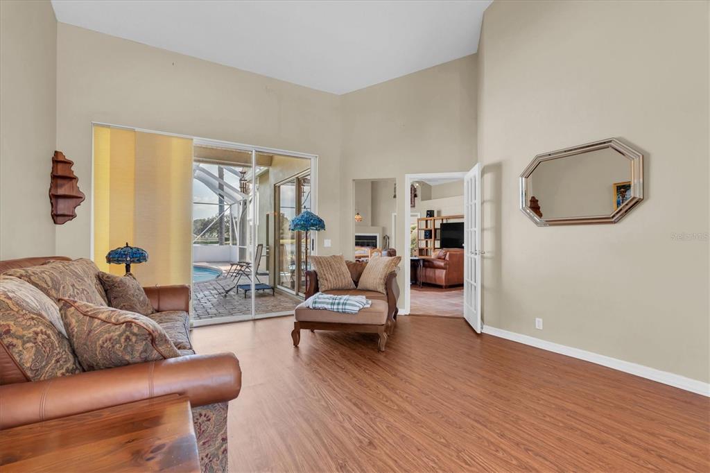 1226 Hoversham Drive New Port Richey, FL 34655 - Photo 12 of 41 a living room with furniture and a large window