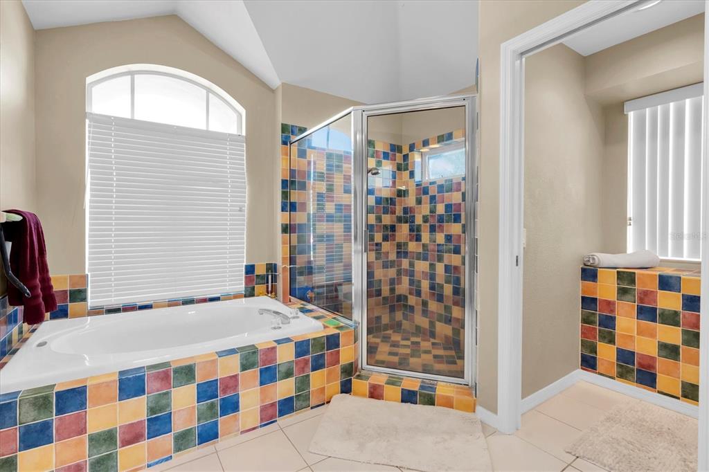 1226 Hoversham Drive New Port Richey, FL 34655 - Photo 27 of 41 a bedroom with a bed and a window