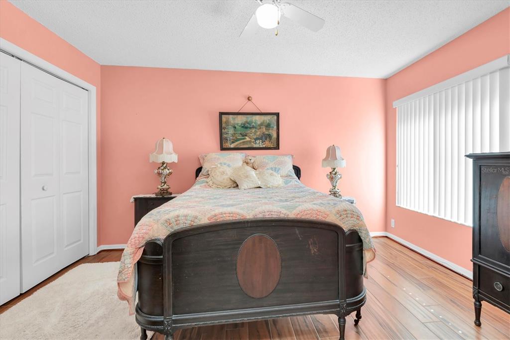 1226 Hoversham Drive New Port Richey, FL 34655 - Photo 28 of 41 a bedroom with a bed and a window