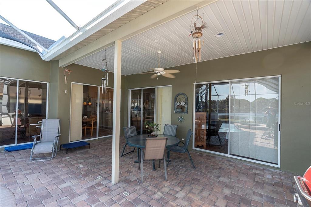 1226 Hoversham Drive New Port Richey, FL 34655 - Photo 40 of 41 a view of a room with a table and chairs