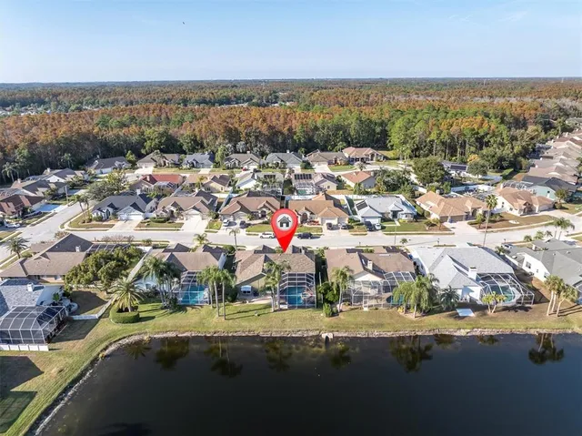 an aerial view of residential building and ocean