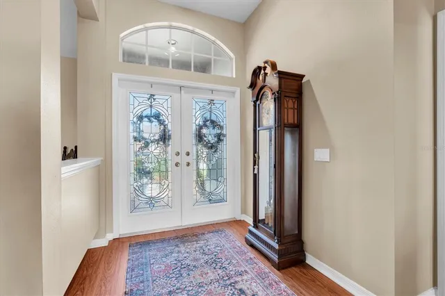 a view of an entryway with a front door