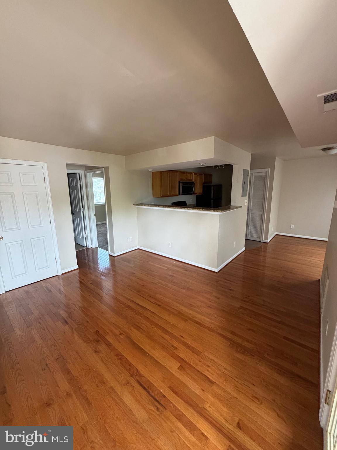2514 Markham Lane, Unit 3 Landover, MD 20785 - Photo 5 of 13 a view of a livingroom with wooden floor