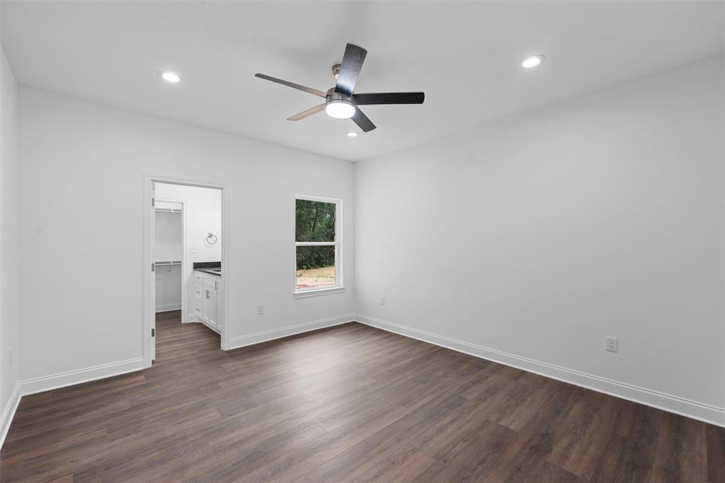 1698 Rogers Hill Road Waco, TX 76705 - Photo 21 of 40 Unfurnished bedroom with dark wood-type flooring, recessed lighting, and baseboards