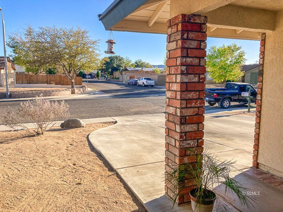 216 West Boston Avenue Ridgecrest, CA 93555 - Photo 36 of 36 a view of a swimming pool with a patio