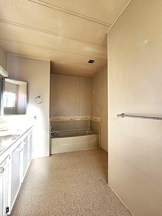 10113 Shamrock Lode Grass Valley, CA 95949 - Photo 28 of 34 a view of a bathroom with sink and mirror