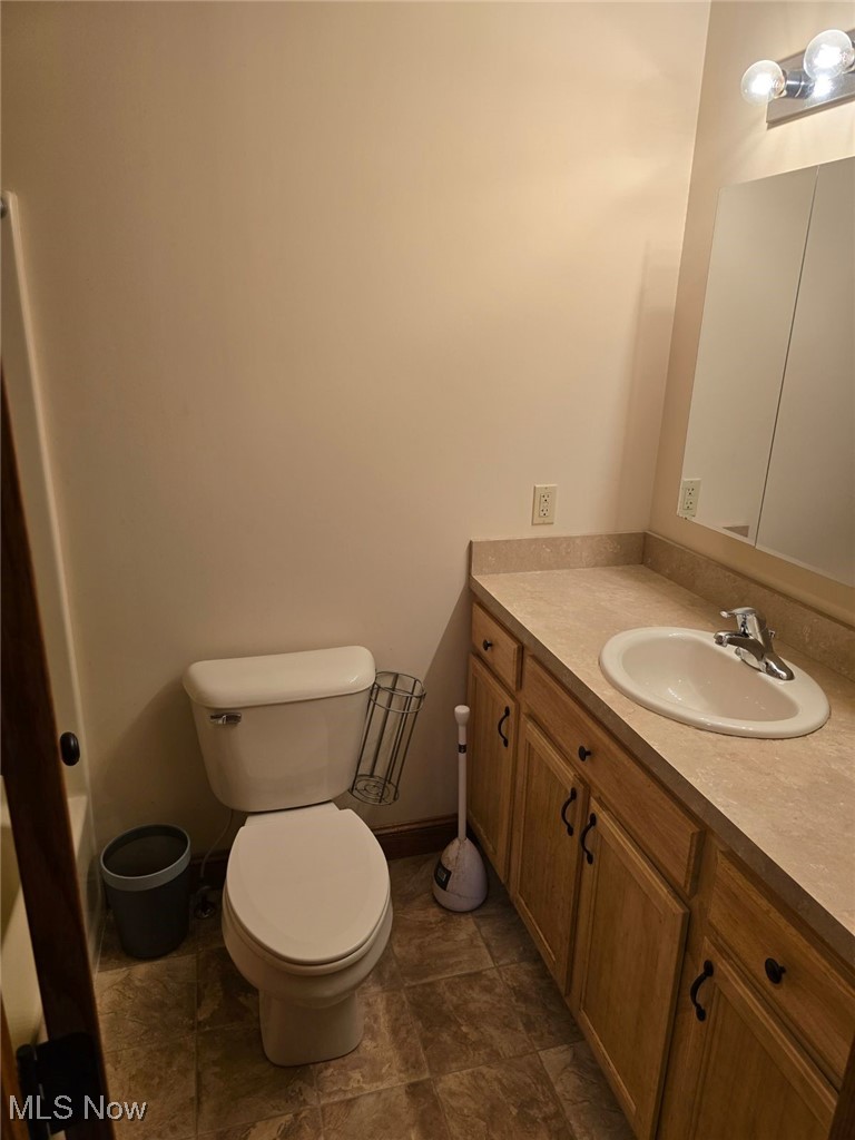 2490 Station Road Medina, OH 44256 - Photo 8 of 21 Bathroom featuring vanity and toilet