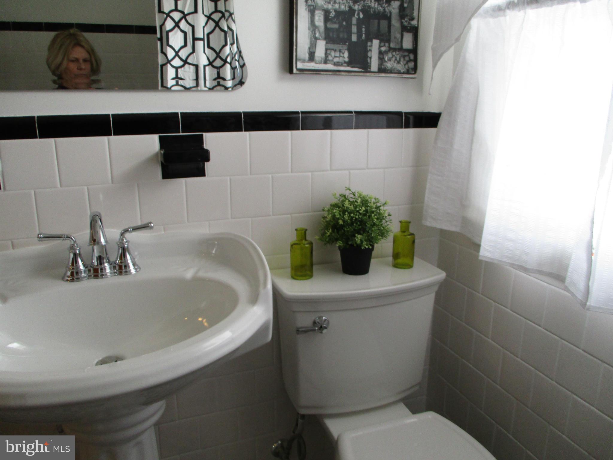 2015 Crestview Road Baltimore, MD 21239 - Photo 13 of 21 a bathroom with a sink and a toilet
