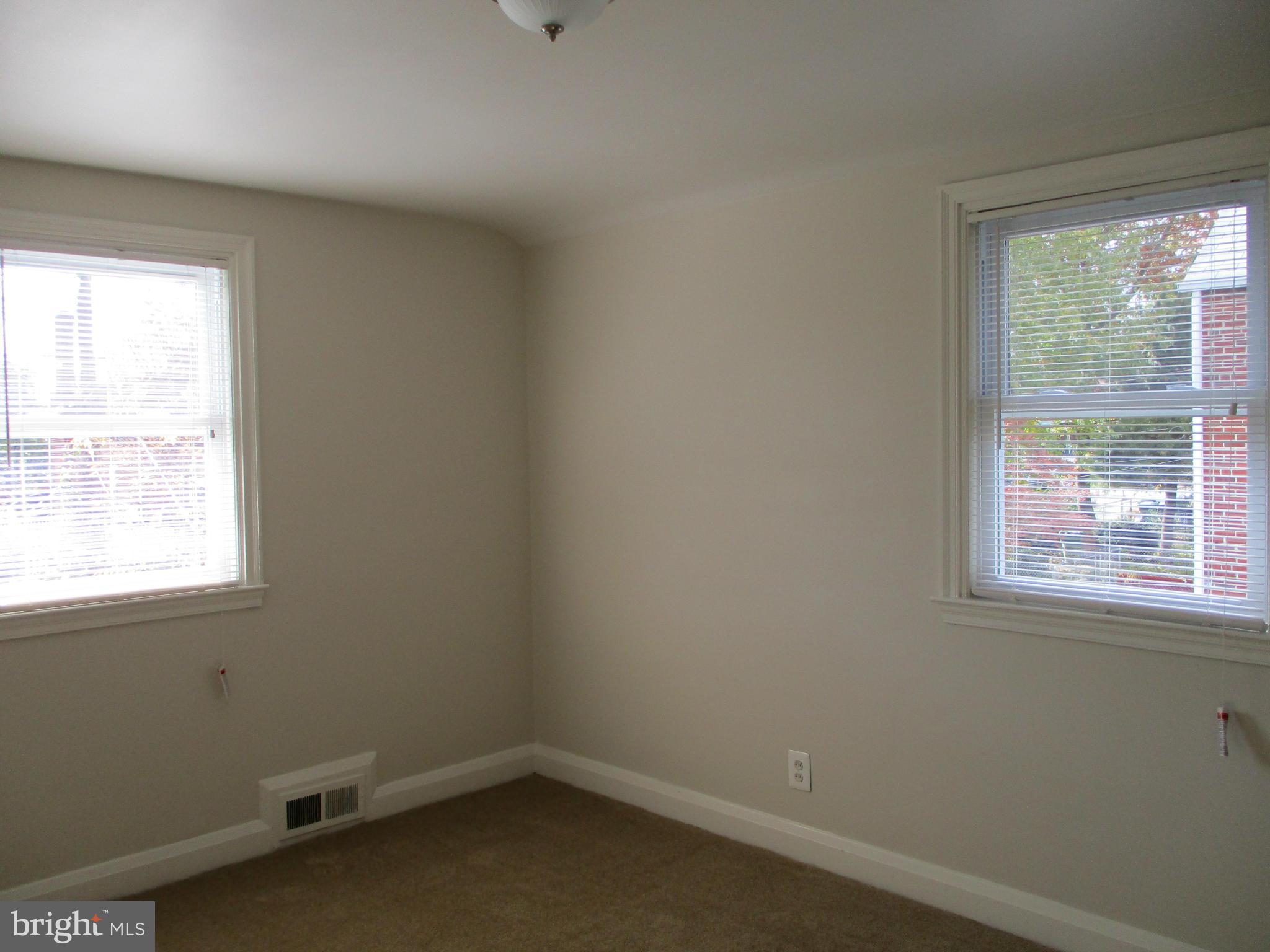 2015 Crestview Road Baltimore, MD 21239 - Photo 16 of 21 an empty room with a window