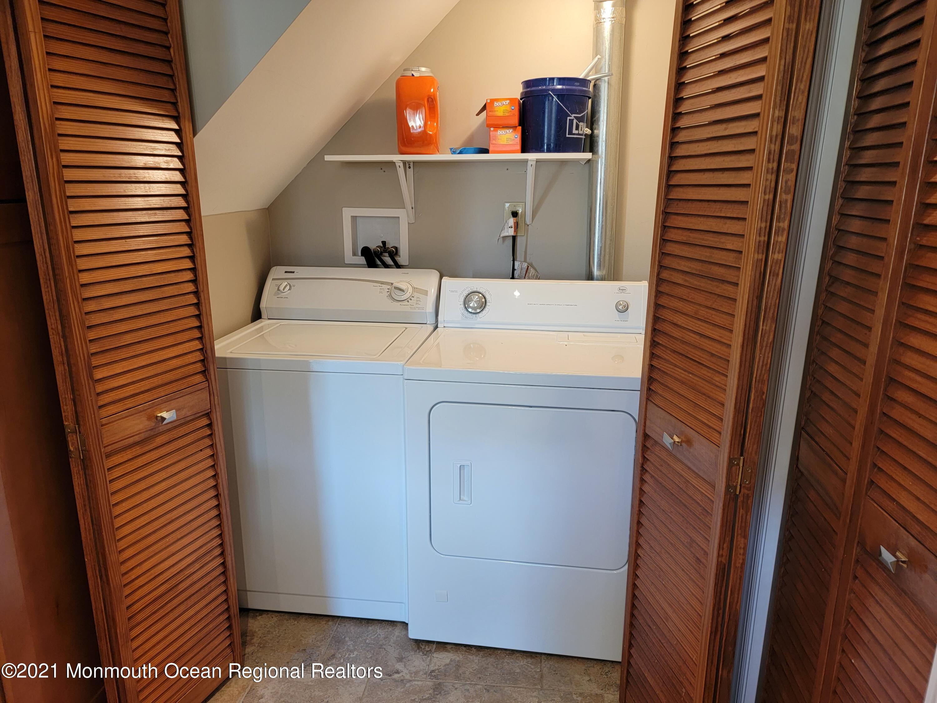 76 Greenwood Loop Road Brick, NJ 08724 - Photo 13 of 24 a utility room with dryer and washer