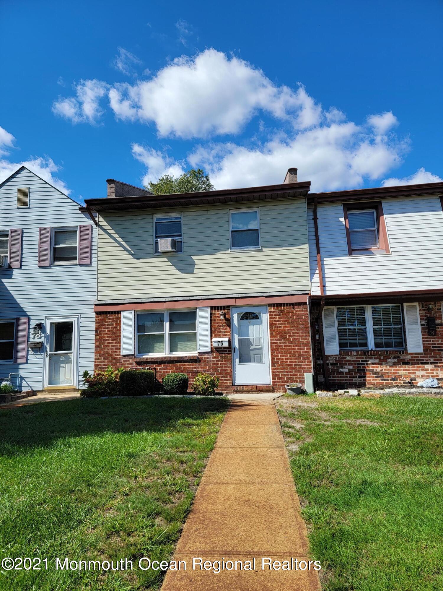 76 Greenwood Loop Road Brick, NJ 08724 - Photo 24 of 24 a front view of a house with a yard