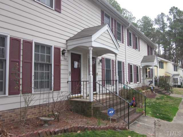 701 Charleston Road Raleigh, NC 27606 - Photo 2 of 25 End unit condo/townhome! Two bedroom, 2 .5 baths with covered front porch on very private cul de sac! First floor utility room! Exterior Front