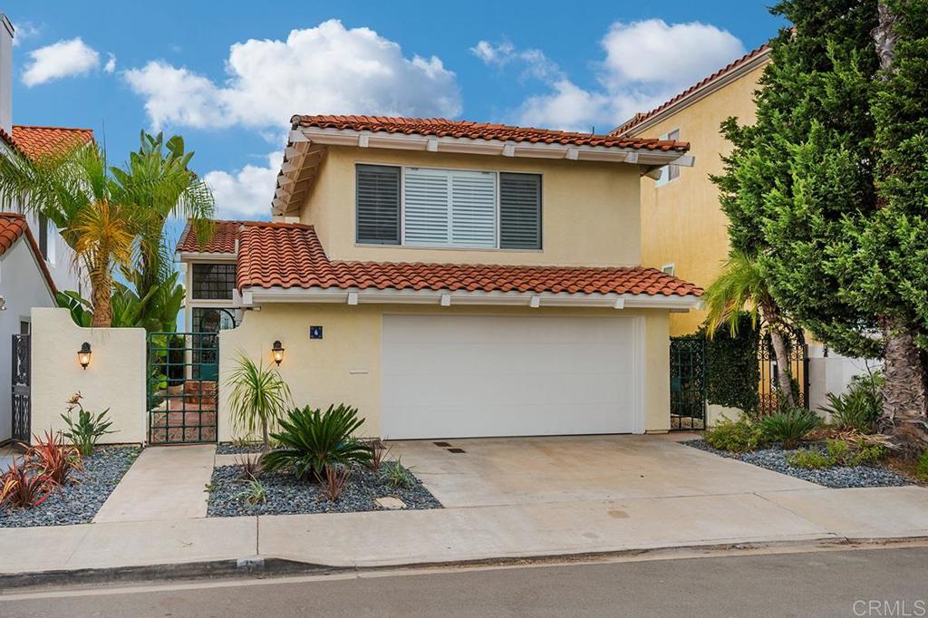 6 Admiralty Cross Coronado, CA 92118 - Photo 2 of 35 a front view of a house with plants