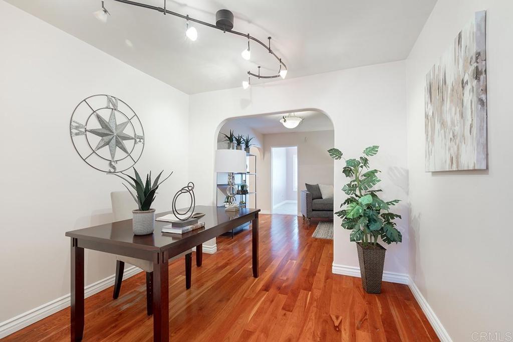 6 Admiralty Cross Coronado, CA 92118 - Photo 21 of 35 a living room with furniture and wooden floor