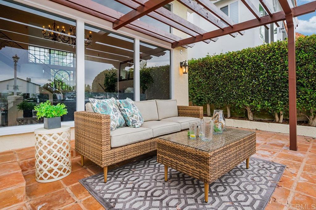 6 Admiralty Cross Coronado, CA 92118 - Photo 28 of 35 a view of a patio with couches and potted plants