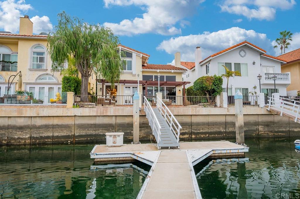 6 Admiralty Cross Coronado, CA 92118 - Photo 35 of 35 a front view of a house with a yard