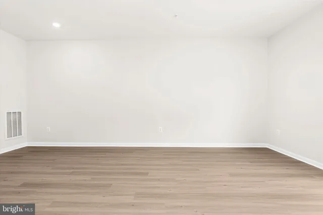 a kitchen with a refrigerator sink and microwave