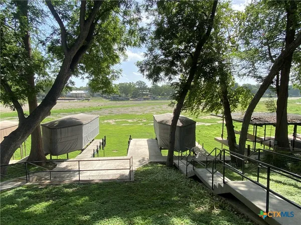 a view of a garden with lake