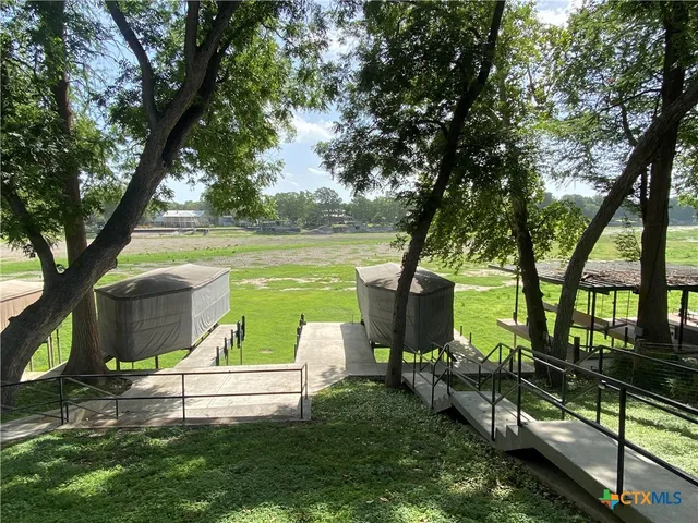 a view of a garden with lake