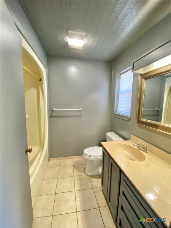 906 Lakeview Trail McQueeney, TX 78123 - Photo 10 of 13 a bathroom with a sink a toilet and mirror
