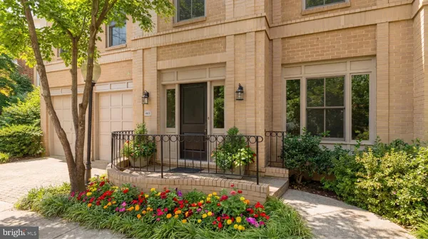 a view of a potted plant in front of a house