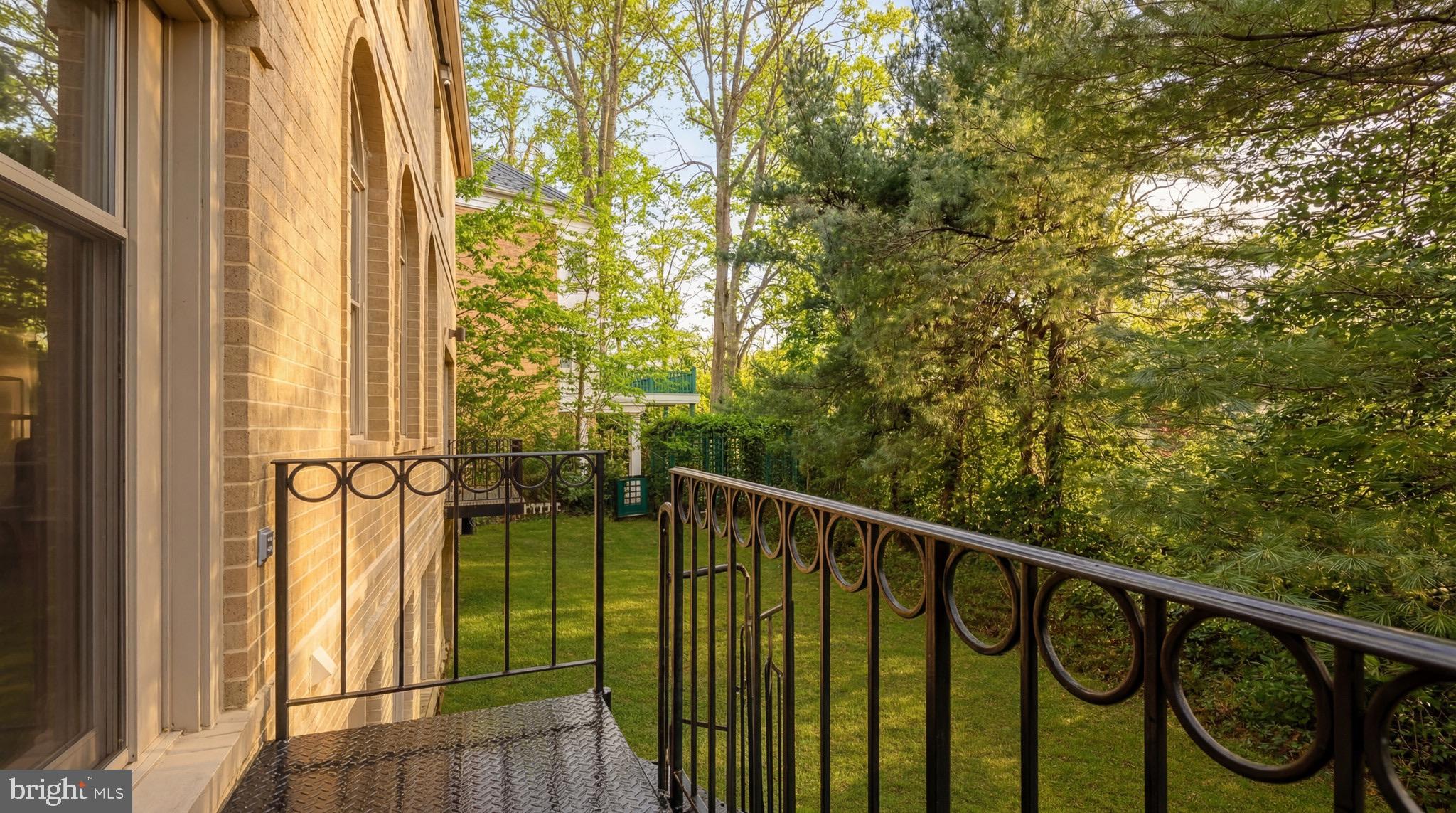 4813 Kemble Place Northwest Washington, DC 20007 - Photo 15 of 18 a view of balcony with wooden floor and fence