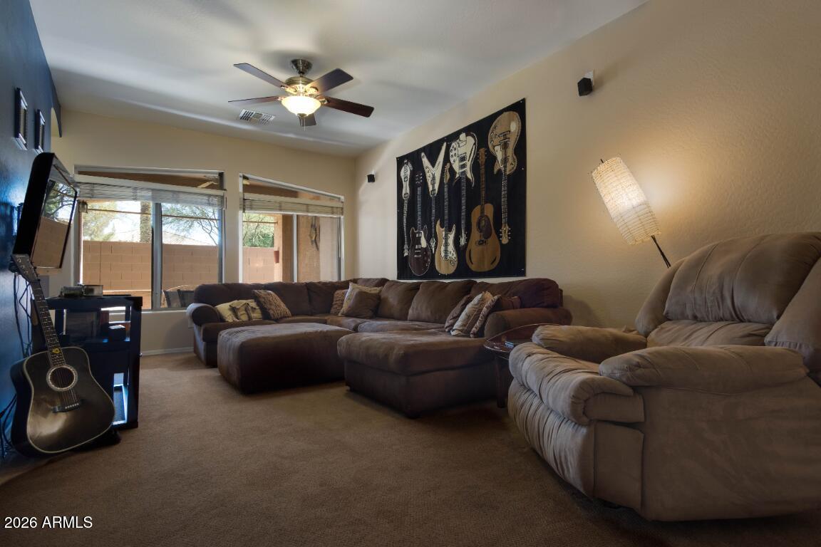 2600 East Springfield Place, Unit 110 Chandler, AZ 85286 - Photo 7 of 18 Springfield family room 3