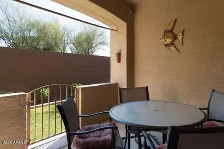 a view of balcony with wooden floor