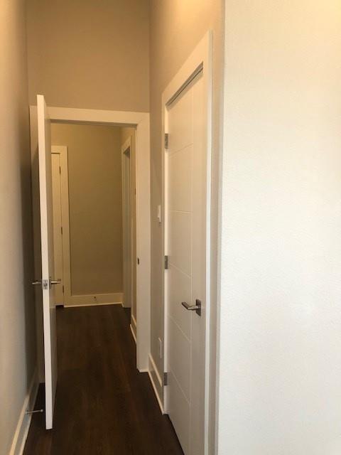 324 Feliks Gwozdz Place, Unit 200 Fort Worth, TX 76104 - Photo 19 of 25 Entry to Primary Bedroom