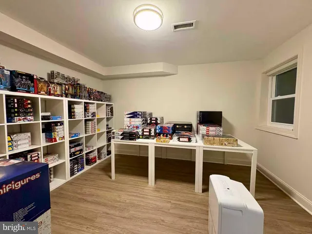 a view of a workspace with furniture